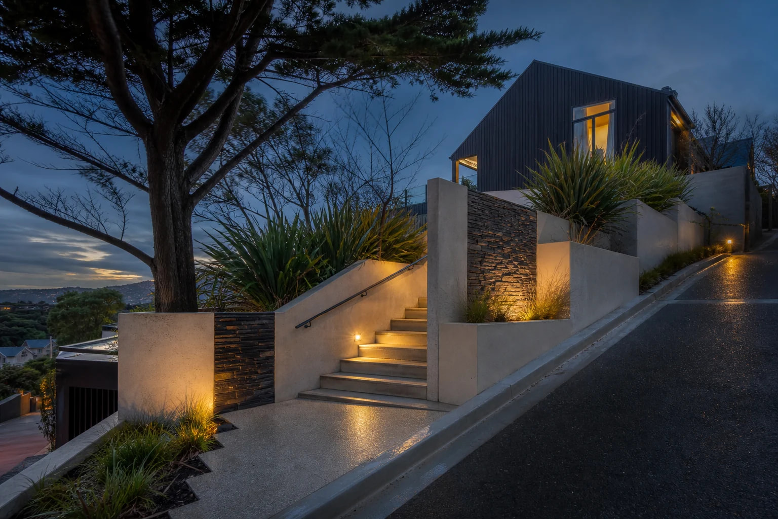 Code-compliant modular retaining wall with stepped height
